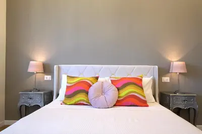 Letto o letti in una camera di attico claudia