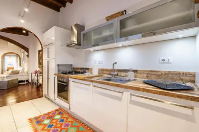Cucina o angolo cottura di Noelle Apartment By San Firenze Collection