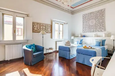 Area soggiorno di Noelle Apartment By San Firenze Collection