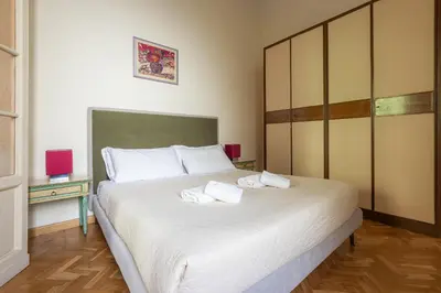 Letto o letti in una camera di Colonna Apartment