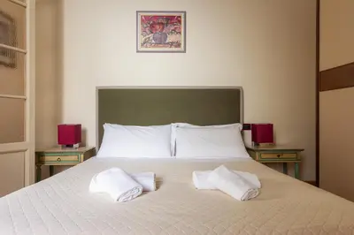 Letto o letti in una camera di Colonna Apartment