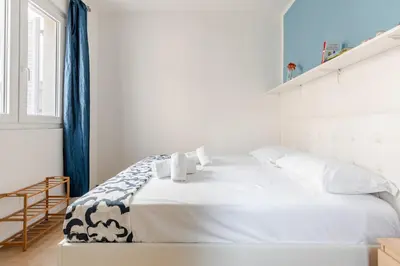 Letto o letti in una camera di New charming apartment with garden in Florence