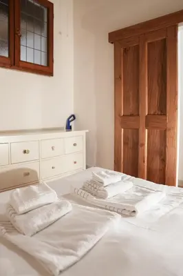 Letto o letti in una camera di Lovely, comfort and beauty near Ponte Vecchio