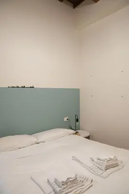 Letto o letti in una camera di Lovely, comfort and beauty near Ponte Vecchio