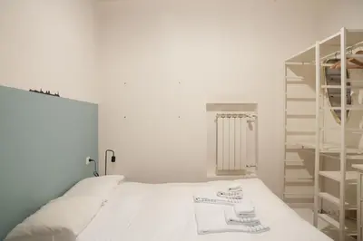 Letto o letti in una camera di Lovely, comfort and beauty near Ponte Vecchio