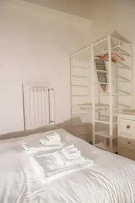 Letto o letti in una camera di Lovely, comfort and beauty near Ponte Vecchio