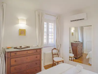 Letto o letti in una camera di Lucia Penthouse - Magic Views in a Medici Palace