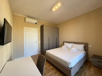 Letto o letti in una camera di Comfort Flat - Careggi Firenze