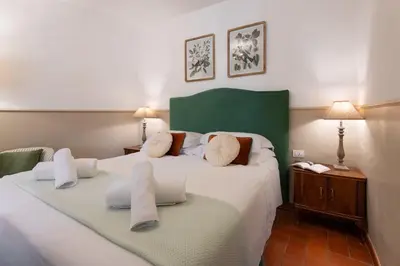 Letto o letti in una camera di Via del Corno 1 - Chiara Apt - Elegant apartment with elevator