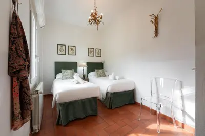Letto o letti in una camera di Via del Corno 1 - Chiara Apt - Elegant apartment with elevator