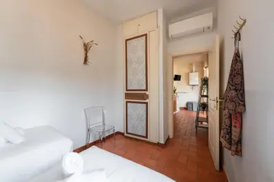 Letto o letti in una camera di Via del Corno 1 - Chiara Apt - Elegant apartment with elevator