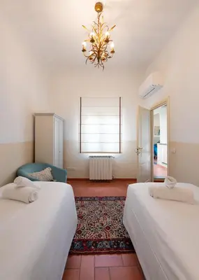 Letto o letti in una camera di Via del Corno, 1 - Paola Apt - Elegant apartment with elevator