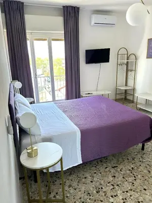 Letto o letti in una camera di Luma' Apartment - Puccini