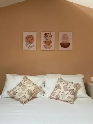 Letto o letti in una camera di Loft Il Giobertino