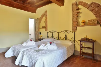 Letto o letti in una camera di Villa D'Arte Agri Resort