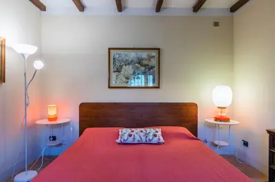 Letto o letti in una camera di Poggio de' Galli