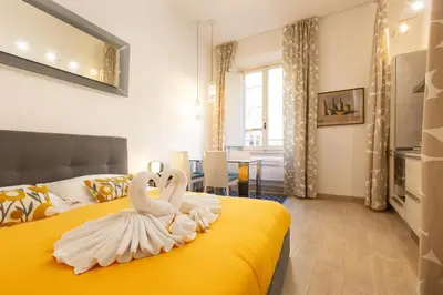 Letto o letti in una camera di Signoria Apartment