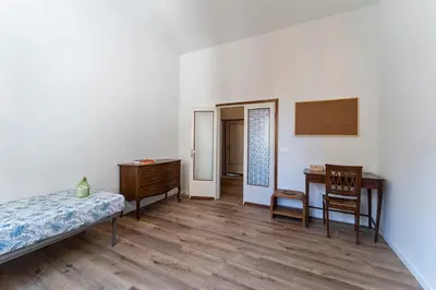 Letto o letti in una camera di UNYCA - Spacious Florence 3-bedroom Apartment