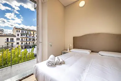 Letto o letti in una camera di YD Bright 2-Bedroom Retreat with Elevator