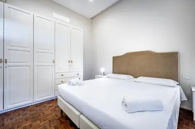 Letto o letti in una camera di YD Bright 2-Bedroom Retreat with Elevator