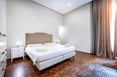 Letto o letti in una camera di YD Bright 2-Bedroom Retreat with Elevator