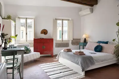 Letto o letti in una camera di Artsy Loft
