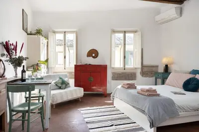 Letto o letti in una camera di Artsy Loft