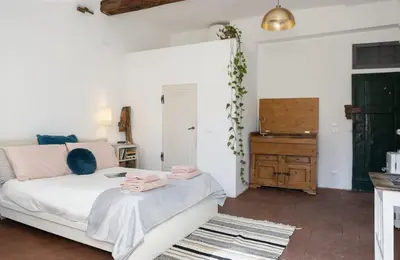 Letto o letti in una camera di Artsy Loft