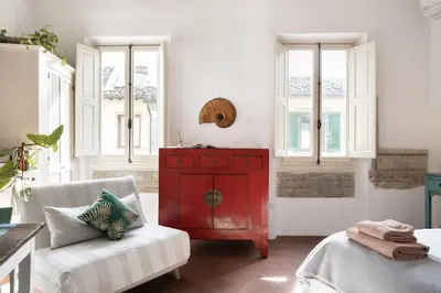 Letto o letti in una camera di Artsy Loft