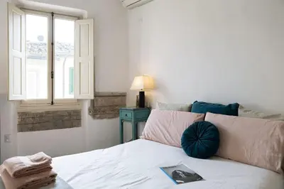 Letto o letti in una camera di Artsy Loft