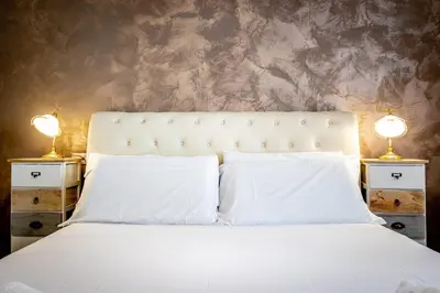 Letto o letti in una camera di iD Light-Filled Home with Garden Oasis