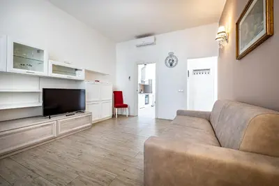 TV o dispositivi per l'intrattenimento presso iD Light-Filled Home with Garden Oasis