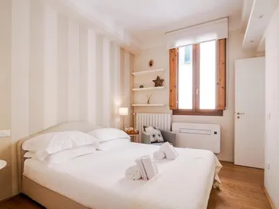 Letto o letti in una camera di Costanza Nest - Hidden retreat near Ponte Vecchio