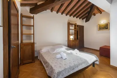 Letto o letti in una camera di Villa Bianca