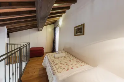 Letto o letti in una camera di Villa Bianca