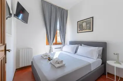Letto o letti in una camera di Porta Romana-Boboli -Florentine Charm Free-Wifi