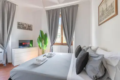 Letto o letti in una camera di Porta Romana-Boboli -Florentine Charm Free-Wifi