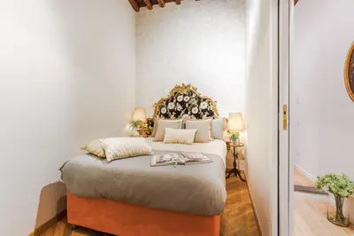 Letto o letti in una camera di The Boboli Retreat Firenze