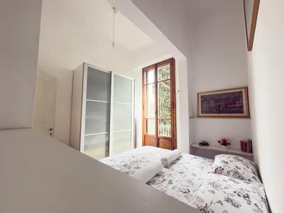 Letto o letti in una camera di Viale Volta Authentic Apartment