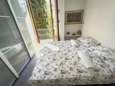 Letto o letti in una camera di Viale Volta Authentic Apartment