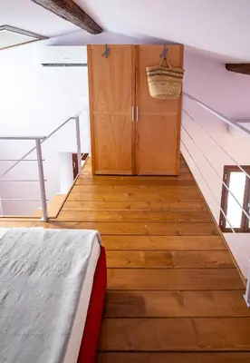 Letto o letti in una camera di Acacia Firenze - Loto