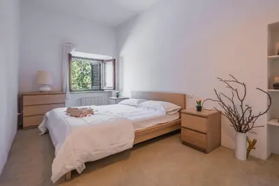 Letto o letti in una camera di Vista Arno a 10 min da Pontevecchio by MOIS Collection