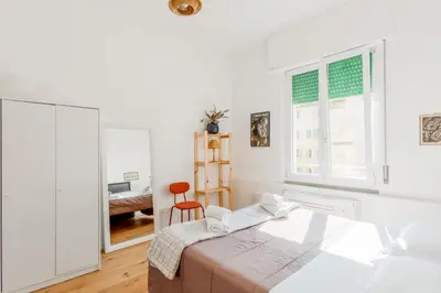 Letto o letti in una camera di GuestHost - Peaceful Apartment in Florence