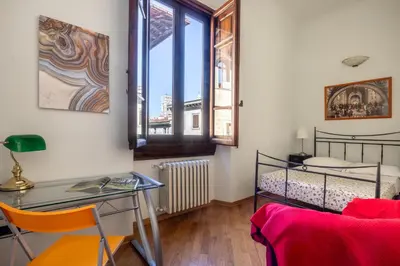 Letto o letti in una camera di Cuore Di Firenze Apartment