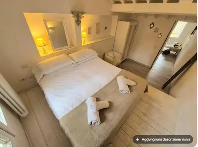 Letto o letti in una camera di Albizi Penthouse