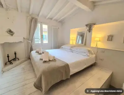 Letto o letti in una camera di Albizi Penthouse