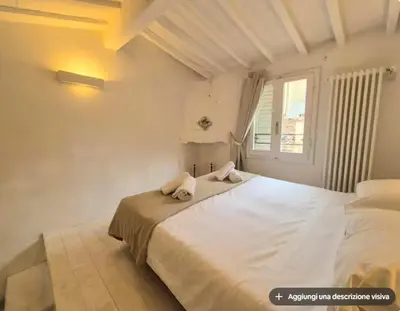 Letto o letti in una camera di Albizi Penthouse