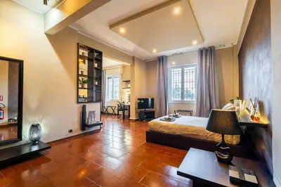 Letto o letti in una camera di Loft Fortezza da Basso -10 minutes from SMN Train Station-