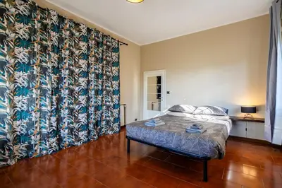 Letto o letti in una camera di Loft Fortezza da Basso -10 minutes from SMN Train Station-