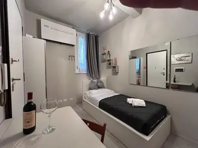 Letto o letti in una camera di Solo nel Cuore di Firenze